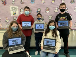 Sixth graders create comic strips during language arts activity