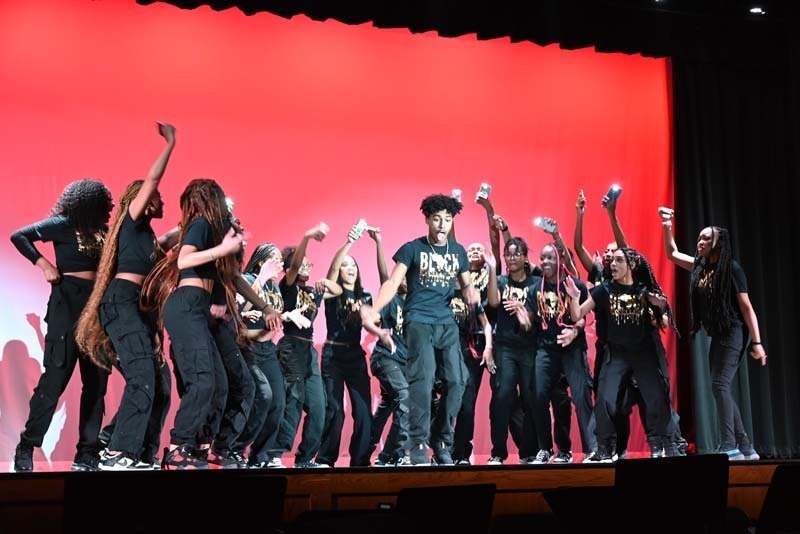 Students dancing on a stage