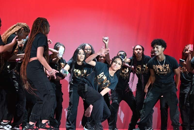 Students dancing on a stage