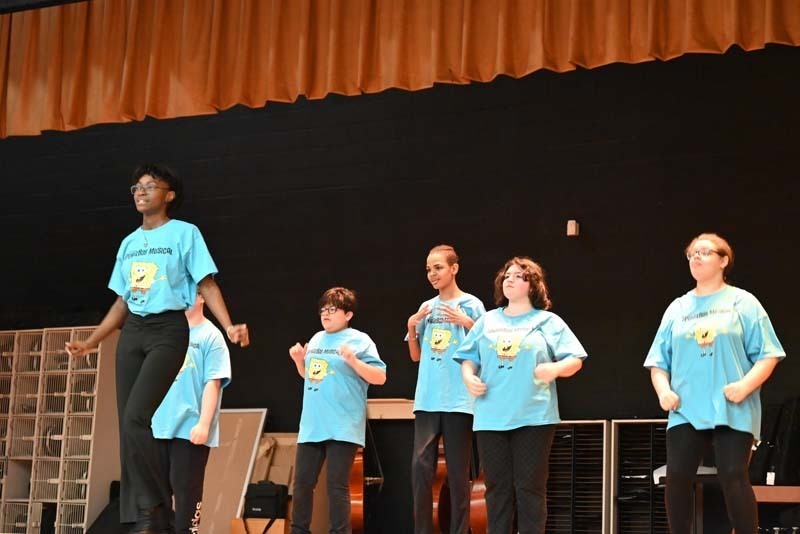 North Babylon High School Students on  stage during the sneak peek